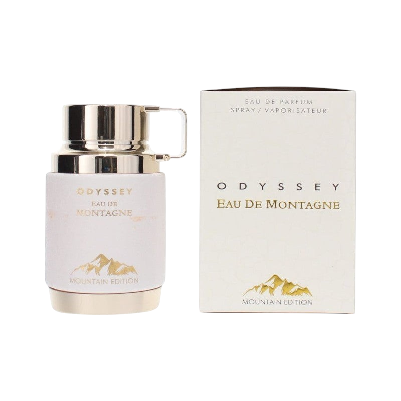 Perfume Odyssey Eau De Montagne de KingParfumCol con frasco blanco y detalles dorados junto a su caja original