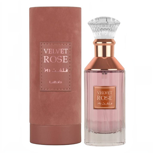 Perfume Velvet Rose de Lattafa de KingParfumCol en frasco de cristal con tapa decorativa y estuche cilíndrico rosa.