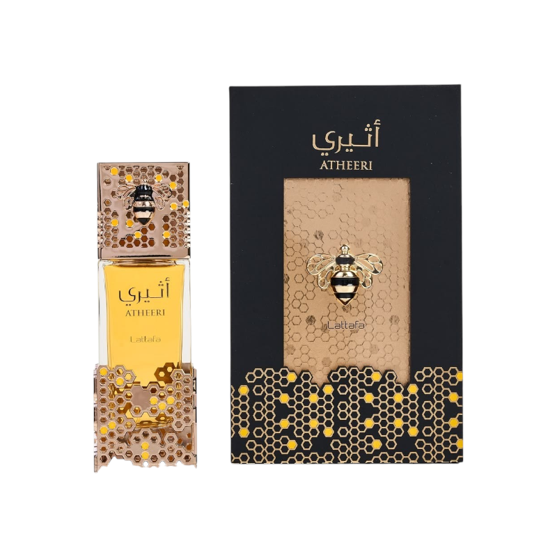 Perfume Atheeri de KingParfumCol con frasco dorado y caja decorada con motivos de panal y una abeja metálica.