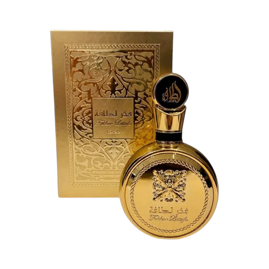 Perfume Fakhar Lattafa Gold de KingParfumCol en frasco redondo dorado con caja decorativa a juego