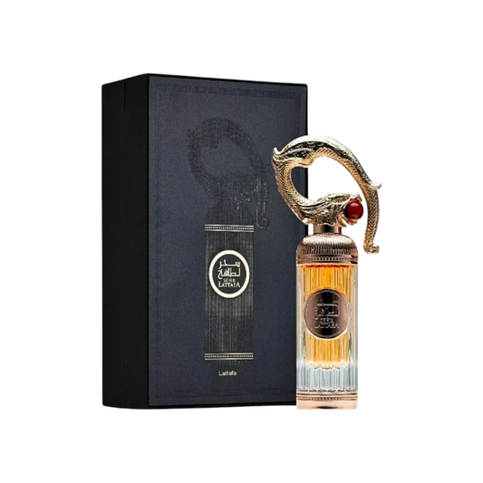 Perfume Sher Lattafa de KingParfumCol en frasco de cristal con tapón dorado en forma de serpiente y caja negra