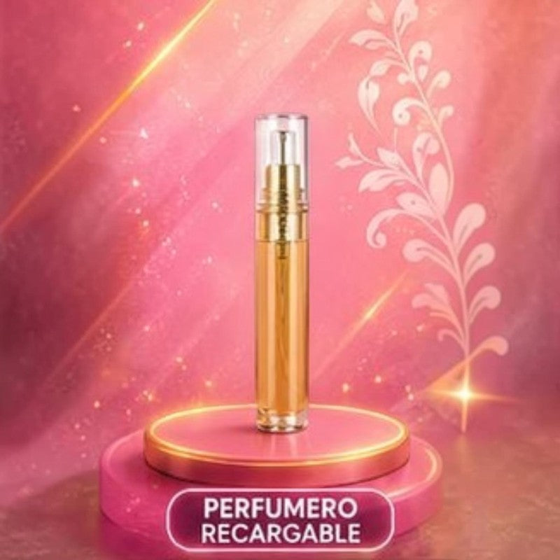 Perfume recargable KingParfumCol en frasco cilíndrico dorado sobre base circular rosa con fondo floral brillante